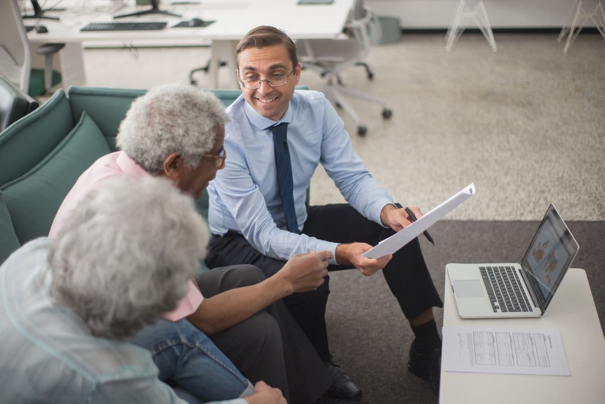 An advisor reviewing tax planning with clients