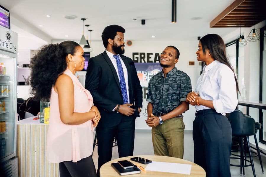 A diverse team meeting in a bright modern office